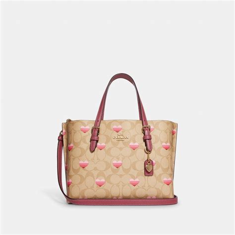 heart shaped purse coach outlet.